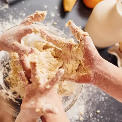 Family Traditions - hands working dough