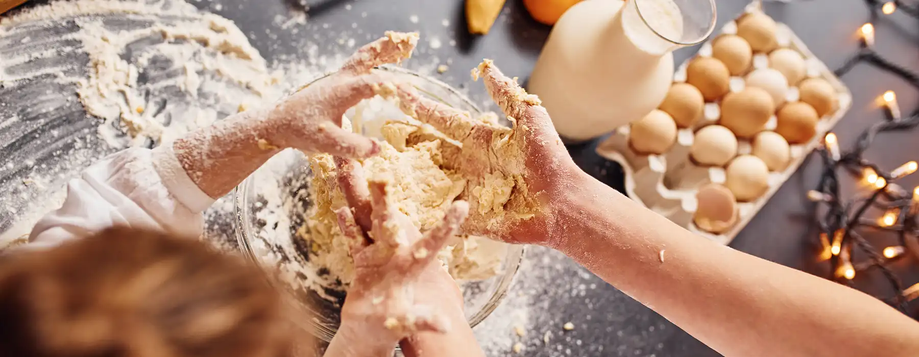 Family Traditions - hands working dough