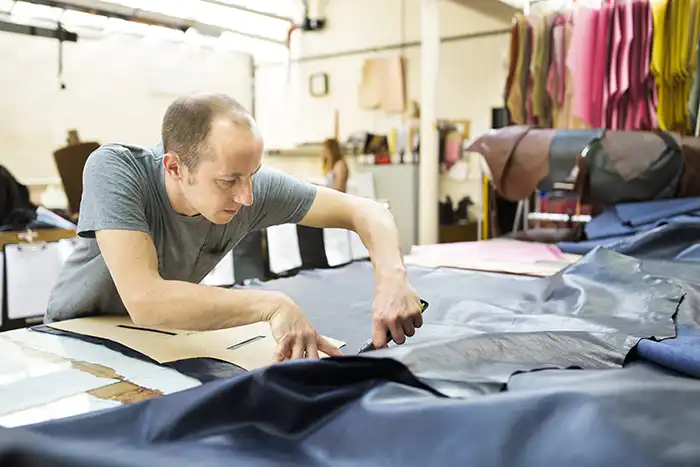 man who works with leather