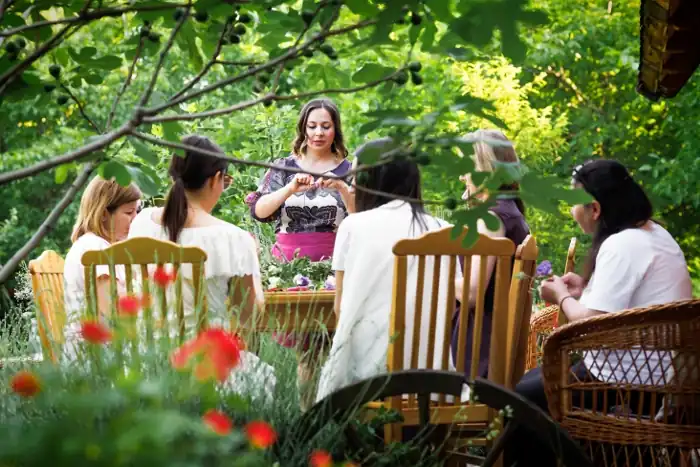 women diving flowers and herbs