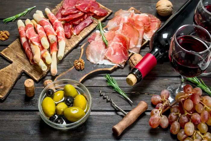 Antipasto background various cured meat
