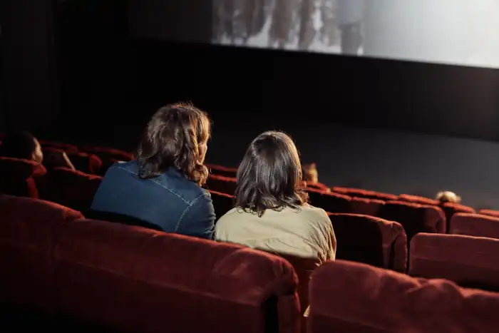 couple watching movie in the cinema