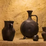 A Taste of Italian Spring Cheese, Ceramics, and Travel Treasures, antique potteryin a stone niche