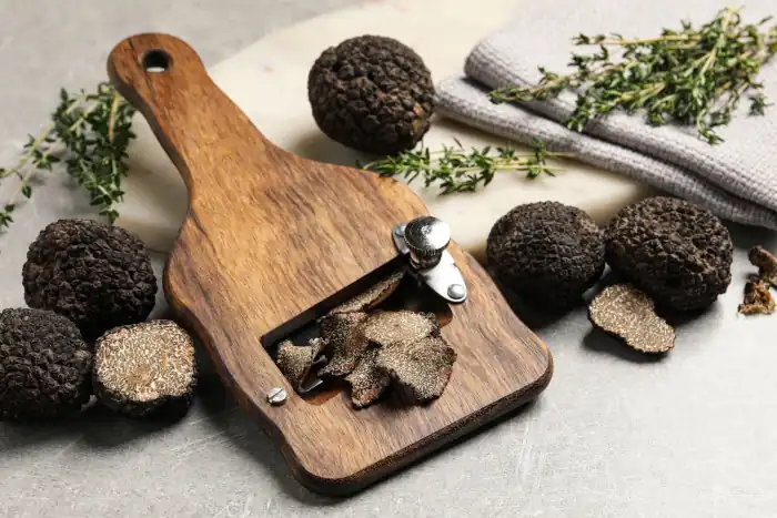 fresh black truffles slicer and thyme