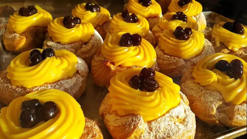 St. Joseph’s Day in Italy: Celebrating Zeppole, Family, and Spring Traditions 7 zeppole di San Giuseppe, eclairs with cream and cherry